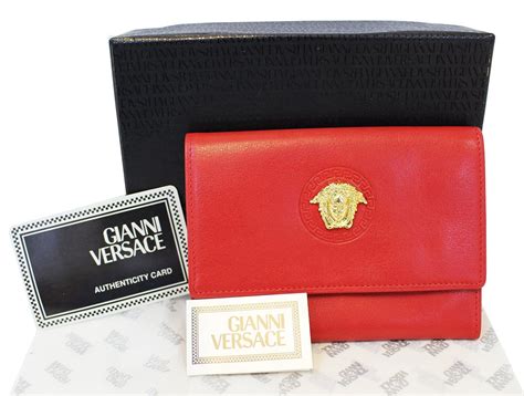 versace handtaschen damen|Versace leather wallet.